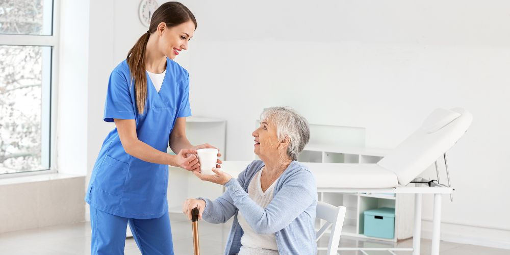 Doctor-Helping-Woman-Parkinson-Syndrome.jpg