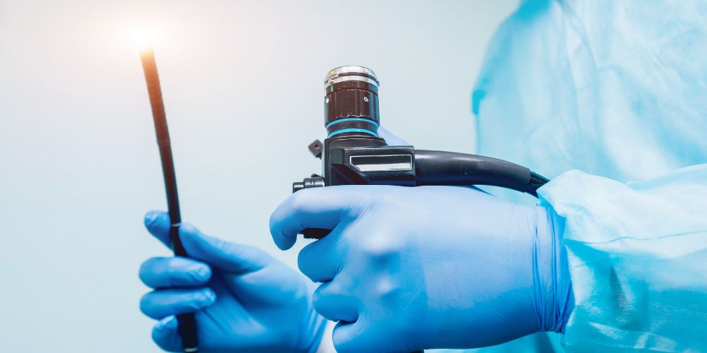 Doctor-holding-endoscope-before-gastroscopy.jpg