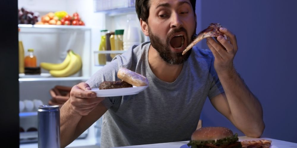 Man-Eating-Junk-Food-Kitchen-Night.jpg