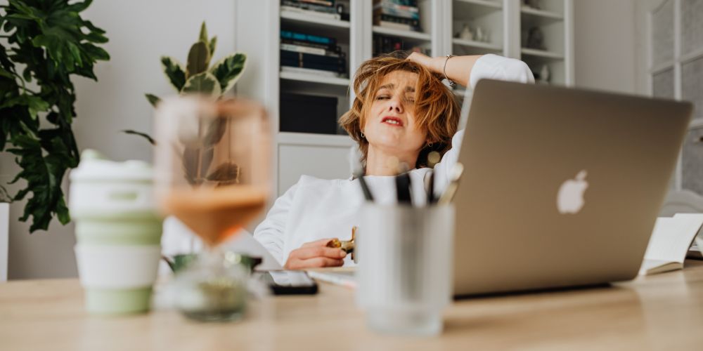 Stressed-Woman-Working-Laptop.jpg